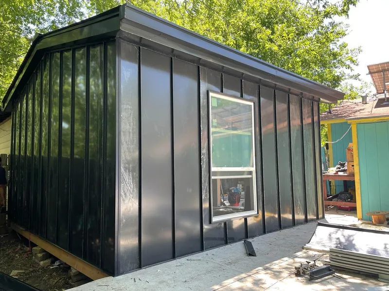 Black standing seam metal wall panels for Metal Roof Installation in East Coventry