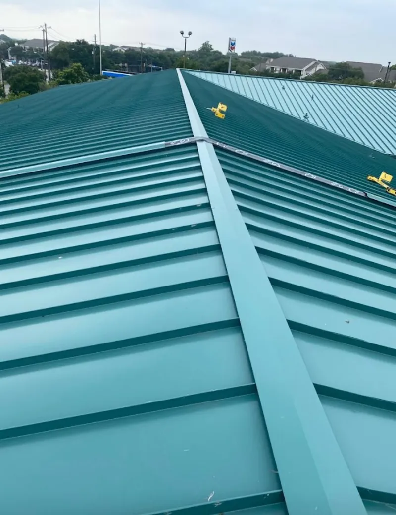 Green commercial metal roof ridge and valley for Metal Roof Repair in East Coventry